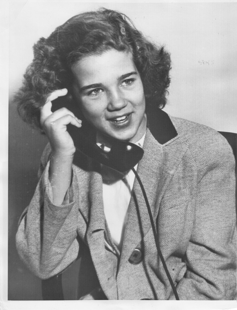 A likely staged photograph of Sally on the telephone after being rescued (courtesy of the author)