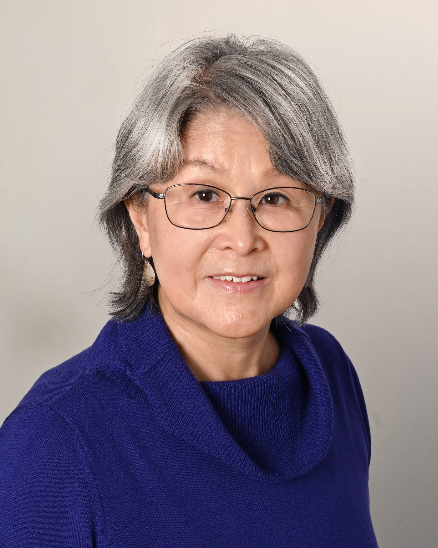 Author Lynne Kutsukake against a neutral background