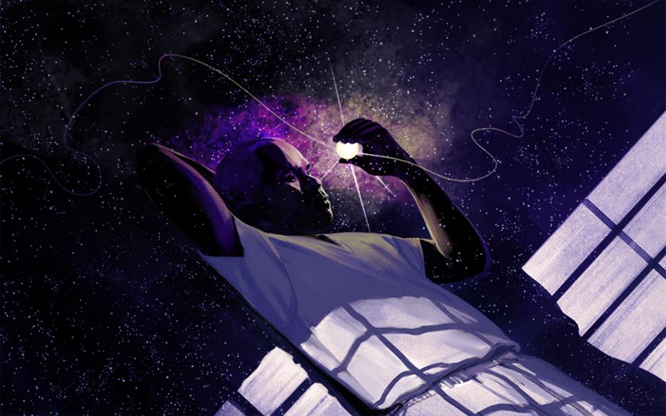 A man holding a glowing orb in his hand. The shadow of prison bars falls over his torso.