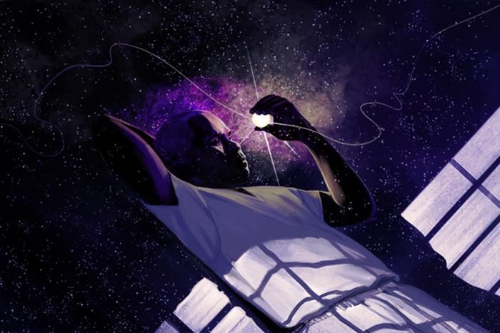 A man holding a glowing orb in his hand. The shadow of prison bars falls over his torso.