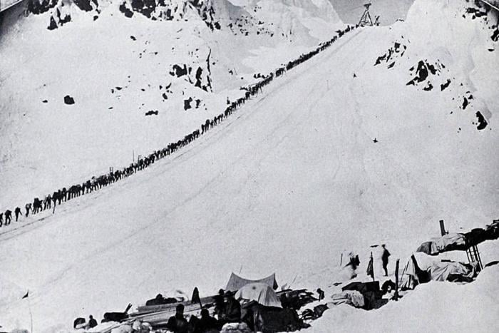 | Ascending Chilkoot Pass, 1989 | From the Klondyke Souvenir published by H.J. Goetzman in 1901, via BC Bibliography Collection