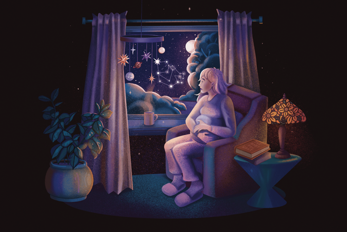 A pregnant person sits in a darkened room, looking out the window at the constellations. 