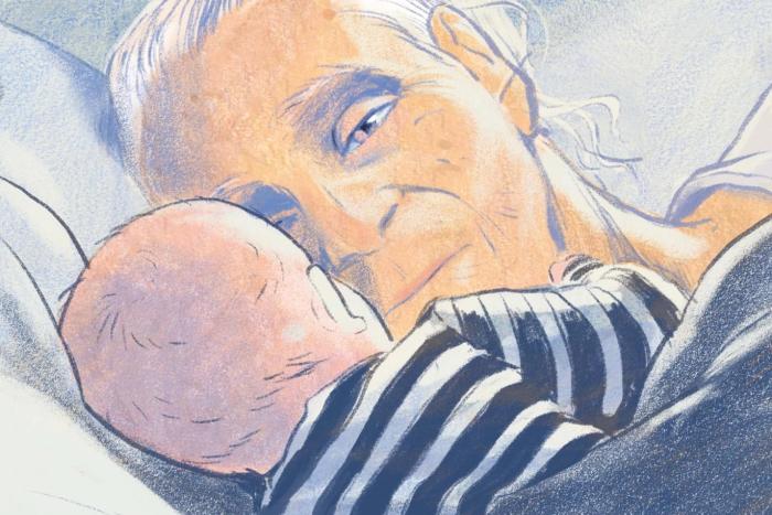 An old woman and a baby gaze at one another